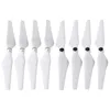 A set of eight white drone propellers arranged in a line against a white background. Náhled obrázku produktu
