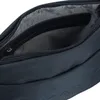 Interior view of an open bag, showing the lining and a zippered pocket. Voir les images du produit
