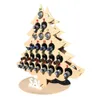 A wooden advent calendar shaped like a Christmas tree, designed to hold mini beverages. Podgląd zdjęcia produktu