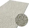 A close-up view of a shaggy carpet with a detailed inset showing the texture of the fibers. Produktbild-Vorschau