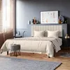 A bedroom scene with a bed, nightstand, and window. Produktbild-Vorschau