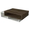 A modern coffee table with a white base and a brown wood-grain top, shown from a three-quarter angle against a white background. Produktbild-Vorschau