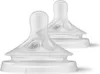 Two clear silicone baby bottle nipples with the number '2' embossed on them, presented on a white background. Produktbild-Vorschau