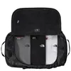 An open black duffel bag with three t-shirts inside: one gray, one black, and one white. Produktbild-Vorschau