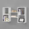 A white modular shelving unit mounted on a gray wall, displaying various decorative items and books. Voir les images du produit
