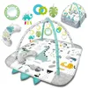 A baby play mat with arches and hanging toys, featuring a dinosaur theme. Anteprima dell’immagine prodotto