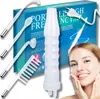 A woman is smiling and touching her face, with a beauty device and its packaging in the background. Produktbild-Vorschau