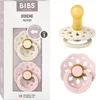 A box containing two BIBS Boheme pacifiers, with two pacifiers shown outside the box. Produktbild-Vorschau