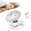 A woman sleeping in bed next to a charging case with earbuds. Produktbild-Vorschau