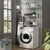 A laundry room scene with a washing machine, dryer, ironing board, and a shelving unit for laundry supplies. Náhled obrázku produktu