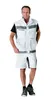 A man is standing and posing in a white and gray work vest and shorts. Produktbild-Vorschau