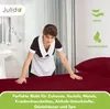 A hotel maid making a bed with burgundy sheets. Produktbild-Vorschau