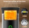 Close-up of a portable coffee maker with steaming liquid inside and diagrams of its components. Podgląd zdjęcia produktu