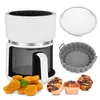 A white air fryer with various accessories and food items displayed around it. Produktbild-Vorschau