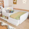 A child's bedroom with a white bed, drawers, and steps. Anteprima dell’immagine prodotto