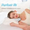A woman is sleeping on a pillow, with text overlay indicating product features. Produktbild-Vorschau
