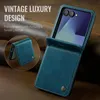 A close-up marketing shot of a blue leather flip phone case for a Samsung Galaxy Z Flip 7, with a smaller inset image showing the case folded. Produktbild-Vorschau