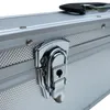A close-up view of the latch and textured surface of a silver aluminum case. Produktbild-Vorschau