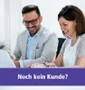 Two people smiling while looking at a laptop. Podgląd zdjęcia produktu
