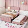 A pink upholstered bed with a trundle bed pulled out, in a child's bedroom. Podgląd zdjęcia produktu