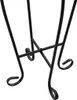 A close-up view of the black metal base of a table. Produktbild-Vorschau