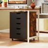 A rolling storage cabinet with five drawers is shown under a desk. Anteprima dell’immagine prodotto