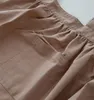 Omgoods - Baumwoll-Schürze mit Vokostasche - Lässig und Produktbild-Vorschau 5