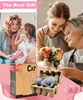 A collage of images showing a mother and daughter exchanging gifts, a young woman and her grandmother with flowers, and a cat-shaped solar garden light with its packaging. Produktbild-Vorschau