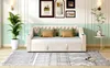 A beige sofa bed is shown in a living room setting with decorative items and a rug. Anteprima dell’immagine prodotto