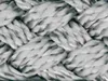 A close-up, detailed view of a thick, braided rope. Produktbild-Vorschau