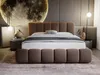 A luxurious bedroom scene featuring a large upholstered bed. Produktbild-Vorschau