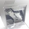 A close-up view of the internal mechanism of a coffee machine. Produktbild-Vorschau