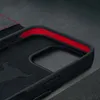 A close-up view of the interior of a black phone case with a red accent. Produktbild-Vorschau