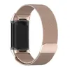 A rose gold Milanese loop watch band attached to a black fitness tracker, shown against a white background. Produktbild-Vorschau