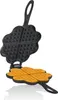 A black cast iron waffle maker in the shape of a four-leaf clover, open to reveal four heart-shaped waffles. Produktbild-Vorschau