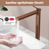 A rose gold faucet is shown with water running into a white sink, with hands washing under the water. A callout box highlights the faucet's aerator. Produktbild-Vorschau