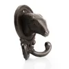 A single, dark-colored cast iron coat hook shaped like a ram's head, mounted on a white background. Produktbild-Vorschau