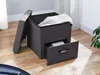 A storage ottoman with an open lid and an open drawer, placed on a wooden floor. Produktbild-Vorschau