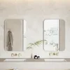 A modern bathroom vanity with two sinks, faucets, and mirrors. Produktbild-Vorschau