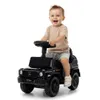 A baby is riding a black toy Mercedes Benz G350d car. Produktbild-Vorschau