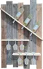 A wooden wine rack with three wine bottles and six wine glasses. Produktbild-Vorschau