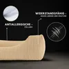 A close-up of a beige pet bed with text overlays highlighting its features. Produktbild-Vorschau