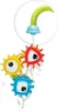 A bath toy with spinning gears and water flowing through it. Podgląd zdjęcia produktu