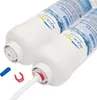 Two white water filters with blue and green labels are shown diagonally against a white background. A white tube with a red connector is attached to the front filter, and a blue cap and a red clip are next to it. Náhled obrázku produktu