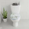 A toilet with a decorative seat in a bathroom setting. Produktbild-Vorschau
