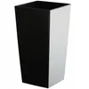 A tall, square-shaped planter with a black front and a white side, set against a white background. Podgląd zdjęcia produktu