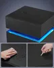 A collage showing details of a black nightstand with blue LED lighting. One panel shows a hand cleaning the surface, another shows a hand testing the surface with a key, and the main panel shows a close-up of the nightstand's top and LED lighting. Podgląd zdjęcia produktu