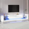 A modern, white TV stand with LED lighting in a living room setting. Produktbild-Vorschau