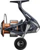 A studio shot of a fishing reel against a white background. Produktbild-Vorschau