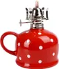 A red and white polka dot oil lamp with a silver wick holder. Náhled obrázku produktu